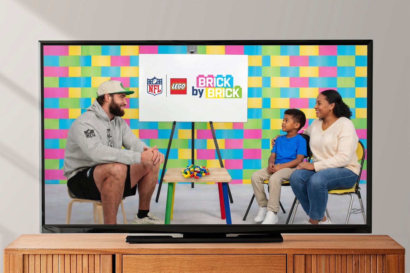 NFL x LEGO Brick by Brick branded content spot on a TV